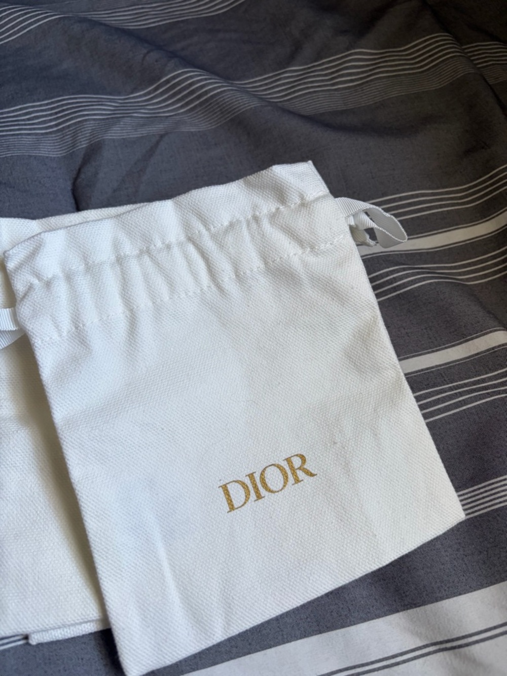 Dior White Drawstring Pouch with Gold Logo Print